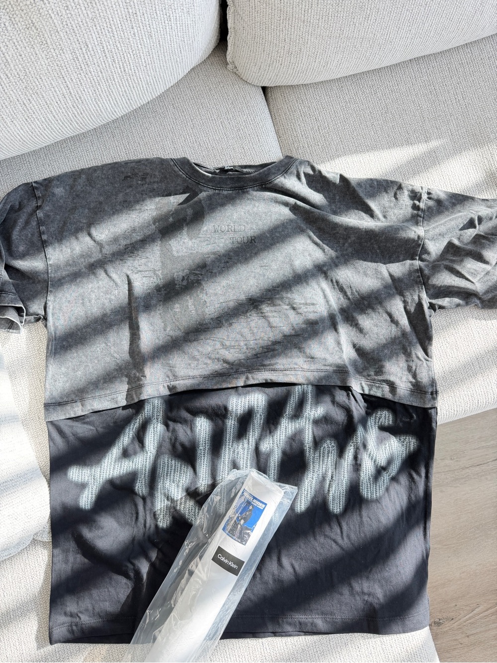 BTS Arirang World Tour official t-shirt with Jungkook and Calvin Klein poster